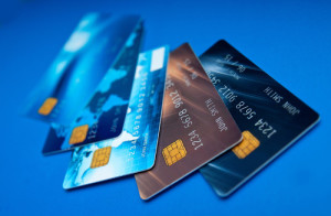 collection of credit card on blue surface